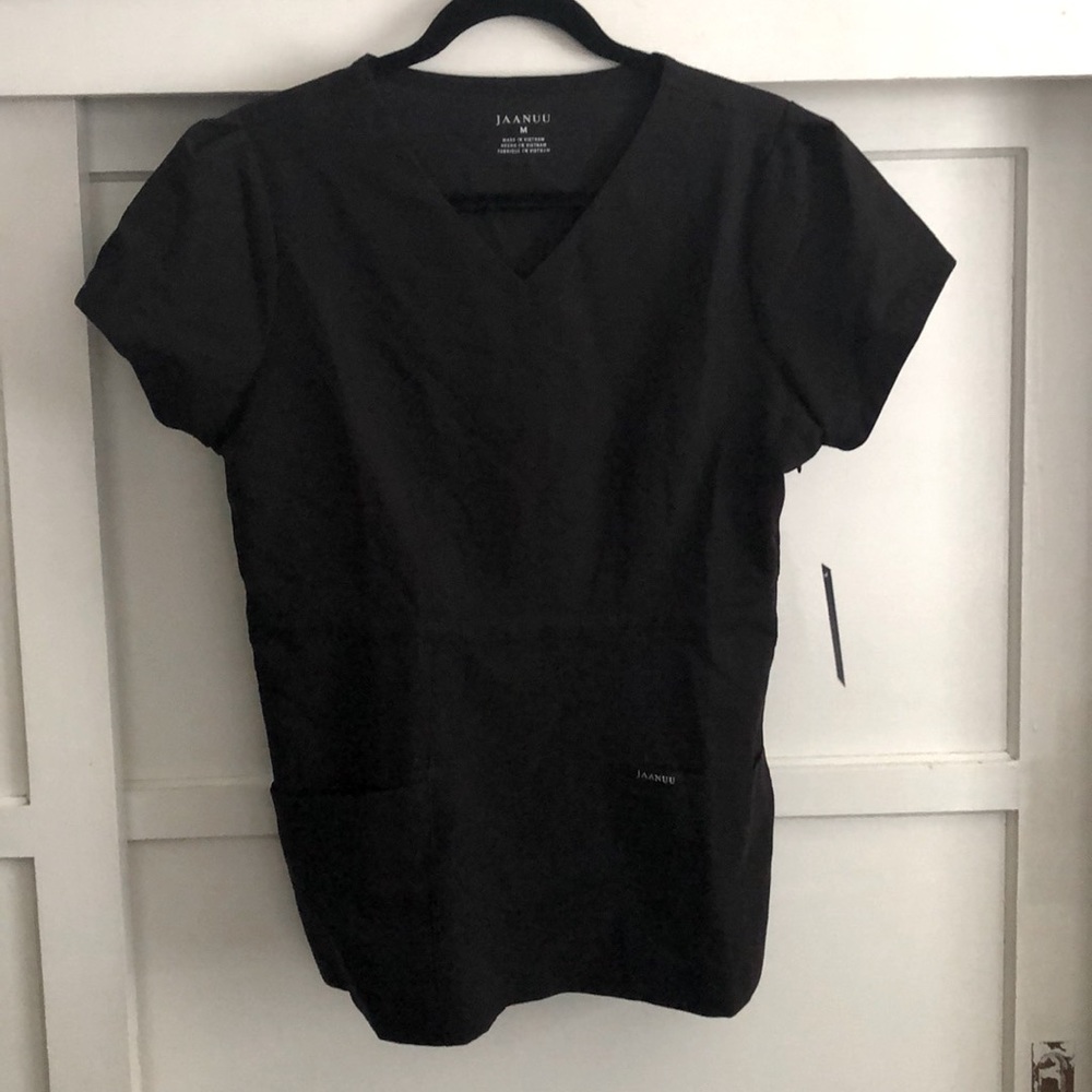 Jaanuu Signature Peplum Scrub top NWT